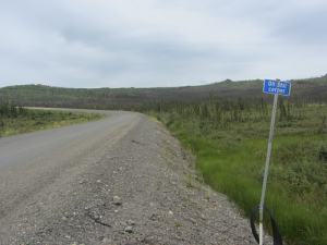 Sign "Oh Shit corner" just north of the Arctic Circle line