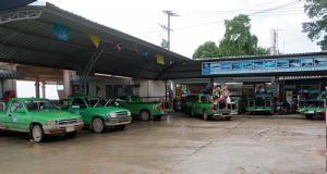 Climb on back of a pickup taxi In Koh Samet, Thailand